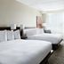 Cleveland Marriott East in Warrensville Heights guest room with two beds, desk, and window seating