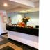 OYO Hotel Georgia Near Fairburn/Atlanta in Union City lobby reception desk with flowers