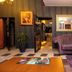 New Hotel Kuc by Marvel in Sveti Stefan lounge with tufted sofa, mirror, and patterned rugs