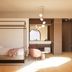 Unaway Hotel Occhiobello A-13, Rovigo: modern guest room with four-poster bed, desk, and seating area