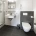 Sea You Hotel Noordwijk bathroom with walk-in shower, wall-hung toilet and sink in Noordwijk
