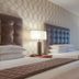 Drury Plaza Hotel St. Louis Chesterfield guest room with two beds, bedside lamps and window view