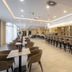 Greenfield Hotel Golf & Spa in Bük lobby bar with long counter and seating