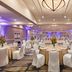 Hilton Scottsdale Resort & Villas ballroom with round banquet tables and white chair covers in Scottsdale