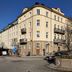 First Hotel City Eskilstuna, Eskilstuna: corner hotel building on a city street with balconies