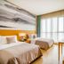 Clovelly Garden Hotel Shanghai twin room with large windows and city view
