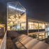 Go Hotel Østerport in Copenhagen at night, with glass facade and railway-side exterior
