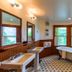 The Lodge on Lake Lure in Lake Lure bathroom with soaking tub, glass shower, and lake view through windows