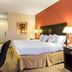 Quality Inn and Suites Oakwood Village - Cleveland South room with king bed, desk and TV in Macedonia