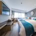 Fairyland Hotel - Kunming Nanping Pedestrian Street Store room with double bed and city view