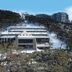 Breathtaker Hotel and Spa in Mount Buller, snowy mountainside hotel amid trees and ski slopes