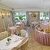 Wald-Hotel Troisdorf dining room with set tables and buffet display