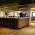 Resort Bad Boekelo bar with long counter and high stools in Boekelo