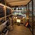 Canne Bianche Lifestyle Hotel in Torre Canne wine cellar with wall-mounted bottle racks and display shelves