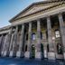 City Tempo in Melbourne, grand neoclassical facade with tall columns and blue sky