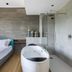 Antico Borgo di Sutri room with freestanding soaking tub and glass shower in Sutri