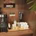 Route Inn Grantia Hakodate Ekimae coffee station with coffee machine, cups, and tea supplies in Hakodate