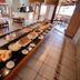 Ilha Flat Hotel in Ilhabela breakfast buffet with pastries, eggs and dining tables in a bright room