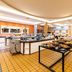Breakfast buffet at Pestana Porto Santo in Porto Santo with a wide dining room and food display