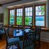 The Lodge on Lake Lure dining room with lake and mountain views through large windows in Lake Lure