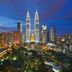 Mandarin Oriental, Kuala Lumpur skyline view of Petronas Twin Towers and city lights at dusk