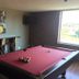 Residence & Conference Centre - Oakville game room with pool table and wall-mounted TV