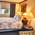 Governor's Rock Motel in Shaftsbury: guest room with bed, window, nightstands and lamps