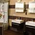 Euro Hotels Drzonków bathroom with corner shower, bathtub, twin sinks and window