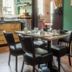 Logis -Hotel & Restaurant De La Place in Seulline dining room with set table and chairs