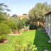 Domo Minnannu Miriu in Loiri Porto San Paolo with garden, terrace, and outdoor seating
