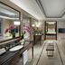 Mandarin Oriental, Kuala Lumpur suite bathroom with soaking tub, vanity, and city skyline view