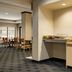 TownePlace Suites by Marriott Williamsport breakfast area with coffee station and dining tables