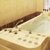 Residence Romanza in Mariánské Lázně: spa bathtub with multiple jets and bathroom window
