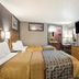 Scottish Inns Harrisburg-Hershey South room with two beds, TV, mini fridge and microwave in New Cumberland