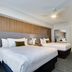 Homewood Suites by Hilton Louisville-East guest room with two beds and mirror