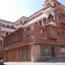 Hotel Harasar Haveli in Bikaner, red sandstone heritage hotel exterior with arched windows and balconies