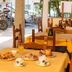Hotel San Francisco in Dorgali restaurant tables set for breakfast near the open streetfront