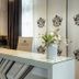Silverton hotel reception desk with floral arrangement and modern decor in Białka Tatrzańska