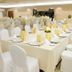 Hotel Fraga do Eume in Capela banquet hall with round tables set for an event