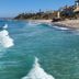 Casa Tropicana in San Clemente with oceanfront beach views and waves along the shoreline