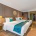 Fairyland Hotel - Kunming Nanping Pedestrian Street Store guest room with twin beds and modern decor