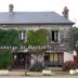 Logis Hôtel Restaurant Auberge Saint Martin in Saint-Gatien-des-Bois, ivy-covered stone hotel exterior