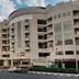 Raf Hotel Apartment in Dubai exterior with curved facade and street view