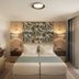 The Phoenicia Malta in Valletta, guest room with twin beds, tropical headboard panel, and floor-to-ceiling curtains