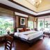 Samui Buri Beach Resort in Ko Samui guest room with large windows and garden view