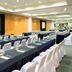 Real Inn Perinorte in Tlalnepantla conference room with rows of banquet tables and projector screen