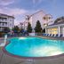 Club Wyndham Nashville outdoor pool with blue lounge chairs and resort buildings in the background