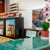 Aparthotel Adagio Paris XV lobby counter with snack and drink display in Paris