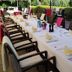 Hotel Icon Győr outdoor restaurant table set with chairs and folded napkins
