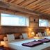 Berg & Spa Hotel Gabelbach in Ilmenau: rustic wood-paneled guest room with four twin beds